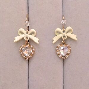 White Bow + Gold Crystal Halo Heart Drop Earrings